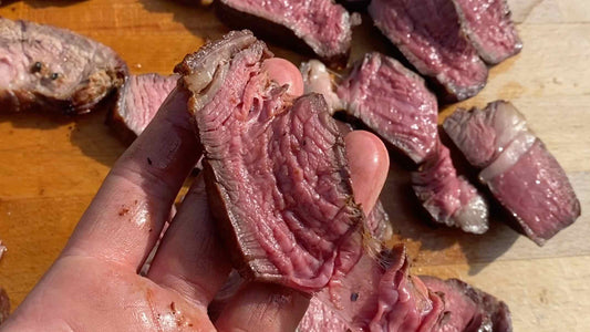 Rare steak cut into strips