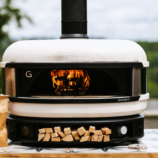 Gozney Dome with Love Logs wood fire